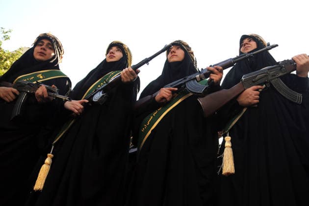 Armed volunteers march through central Tehran in Basij-led mobilization rally TEHRAN, IRAN - SEPTEMBER 18: (RESTRICTIONS: No Access Israel Media Persian Language TV Stations Outside Iran Strictly No Access BBC Persian VOA Persian Manoto TV Iran International TV) Armed volunteers registered with the Janfada-ye Iran program march between Imam Hossein Square and Enqelab Square in Tehran, Iran on September 18, 2026. Led by the Basij paramilitary force affiliated with the Islamic Revolutionary Guard Corps (IRGC), demonstrators carrying automatic rifles and long-barrel weapons took to the streets to demonstrate wartime mobilization and national defense readiness following recent US and Israeli strikes. Fatemeh Bahrami Anadolu Tehran Iran. Ed  Copyright: x2026xAnadoluxFatemehxBahramix