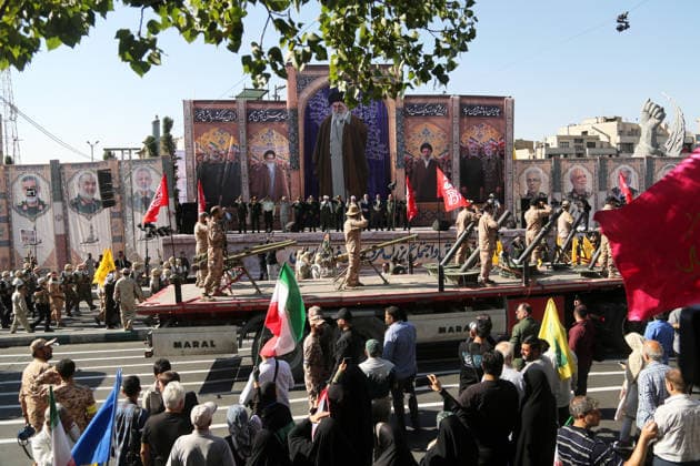 Armed volunteers march through central Tehran in Basij-led mobilization rally TEHRAN, IRAN - SEPTEMBER 18: (RESTRICTIONS: No Access Israel Media Persian Language TV Stations Outside Iran Strictly No Access BBC Persian VOA Persian Manoto TV Iran International TV) Armed volunteers registered with the Janfada-ye Iran program march between Imam Hossein Square and Enqelab Square in Tehran, Iran on September 18, 2026. Led by the Basij paramilitary force affiliated with the Islamic Revolutionary Guard Corps (IRGC), demonstrators carrying automatic rifles and long-barrel weapons took to the streets to demonstrate wartime mobilization and national defense readiness following recent US and Israeli strikes. Fatemeh Bahrami Anadolu Tehran Iran. Ed  Copyright: x2026xAnadoluxFatemehxBahramix