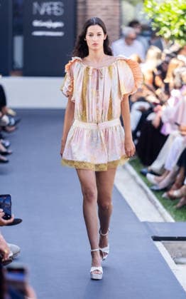 Custo Fashion Show at MBFW 2026 A model during the Custo Barcelona fashion show as part of Mercedes-Benz Fashion Week at Nebrija University on September 18, 2026, in Madrid, Spain. Custo presents its Spring Summer 2027 collection, titled Unexpected. The Catalan designer conceives this collection as an emotional manifesto to combat routine in the way we dress. SEPTEMBER 18, 2026, Madrid, Spain  Copyright: xEduardoxParrax 7783760