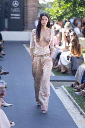 Custo Fashion Show at MBFW 2026 A model during the Custo Barcelona fashion show as part of Mercedes-Benz Fashion Week at Nebrija University on September 18, 2026, in Madrid, Spain. Custo presents its Spring Summer 2027 collection, titled Unexpected. The Catalan designer conceives this collection as an emotional manifesto to combat routine in the way we dress. SEPTEMBER 18, 2026, Madrid, Spain  Copyright: xEduardoxParrax 7783774