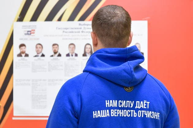 RUSSIA, KRASNODAR - SEPTEMBER 18, 2026: A man read an election candidate list at a polling station during the 2026 Russian legislative election. From September 18 to 20, Russia holds regional parliamentary elections, alongside the election of members to the Russian State Duma (the lower house of the Russian parliament) Krasnodar Russia  - ZUMAt113 20260918_zaa_t113_435 Copyright: xRomanxSokolovx