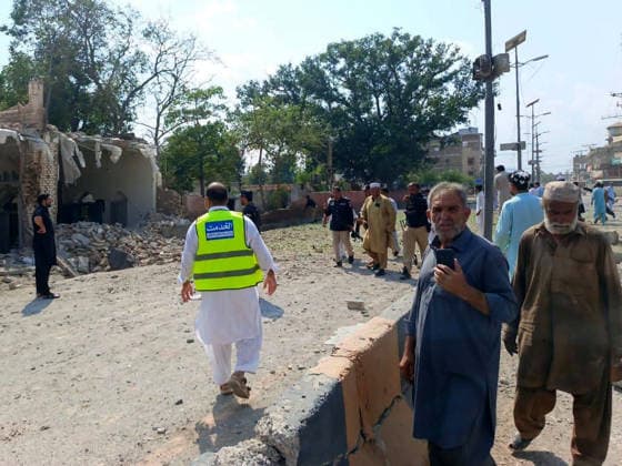 (260918) -- KOHAT, Sept. 18, 2026 -- This photo taken with mobile phone shows a blast site at Kohat in Pakistan s Khyber Pakhtunkhwa province on Sept. 18, 2026. At least 16 people were killed and over 50 others injured in a twin suicide attack inside a residential compound of police in Pakistan s Khyber Pakhtunkhwa province on Friday, police and rescue officials said. (Str Xinhua) (SpotNews) PAKISTAN-KOHAT-BLAST-DEATH TOLL AhmadxKamal 