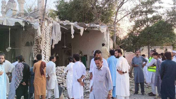 16 killed in suspected suicide bombing near police compound in NW Pakistan KHYBER PAKHTUNKWA, PAKISTAN - SEPTEMBER 18: People gather around a damaged mosque following a suicide bombing targeting a police compound in Kohat district of Khyber Pakhtunkhwa province, Pakistan, on September 18, 2026. At least 16 people, including 11 civilians and five police officers, were killed and over 50 others wounded in a suspected suicide bombing targeting a police compound in northwestern Pakistan during Friday congregational prayers, officials said. The casualties occurred when an explosives-laden vehicle rammed into the Old Police Lines gate in Kohat district of Khyber Pakhtunkhwa province, a senior police official said, according to local broadcaster G  Copyright: x2026xAnadoluxMohamudxIsmailxKulanex