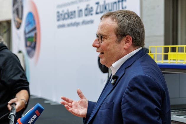 September 18, 2026, Düsseldorf, North Rhine-Westphalia: Transportation Minister Oliver Krischer on the sidelines of the NRW 2026 Infrastructure Conference, themed Building and Renovating Bridges Faster, Düsseldorf, Ministry of the Environment, Nature Conservation, and Transportation, Emilie Preyer Platz 1, North Rhine-Westphalia, Germany