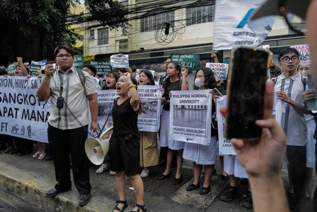 September 18, 2026, Philippines: Students from La Salle along with One Taft, a coalition of Taft-based schools, stage a Black Friday Protest on Friday at Taft Ave, Metro Manila. It coincided with the Black Friday Protests from different universities and a preparation for the mass movement on Sept. 21 for the Martial Law anniversary. Among the calls were for the alleged human rights abuses, corruption, and the Pax Silica initiative under the administration of President Ferdinand Marcos Jr. Philippines - ZUMAr240 20260918_zip_r240_033 Copyright: xMarcxDominicxRostratax
