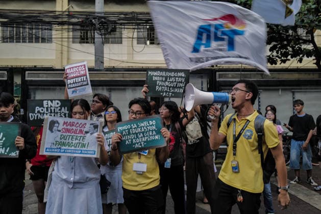 September 18, 2026, Philippines: Students from La Salle along with One Taft, a coalition of Taft-based schools, stage a Black Friday Protest on Friday at Taft Ave, Metro Manila. It coincided with the Black Friday Protests from different universities and a preparation for the mass movement on Sept. 21 for the Martial Law anniversary. Among the calls were for the alleged human rights abuses, corruption, and the Pax Silica initiative under the administration of President Ferdinand Marcos Jr. Philippines - ZUMAr240 20260918_zip_r240_034 Copyright: xMarcxDominicxRostratax
