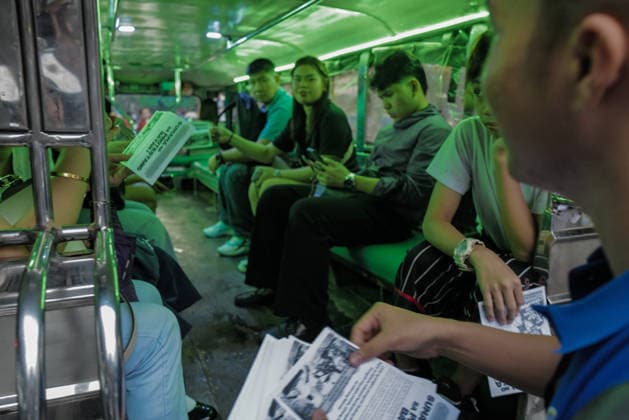September 18, 2026, Philippines: Students giving pamphlets to commuters during the Black Friday Protest on Friday at Taft Ave, Metro Manila. It coincided with the Black Friday Protests from different universities and a preparation for the mass movement on Sept. 21 for the Martial Law anniversary. Among the calls were for the alleged human rights abuses, corruption, and the Pax Silica initiative under the administration of President Ferdinand Marcos Jr. Philippines - ZUMAr240 20260918_zip_r240_022 Copyright: xMarcxDominicxRostratax