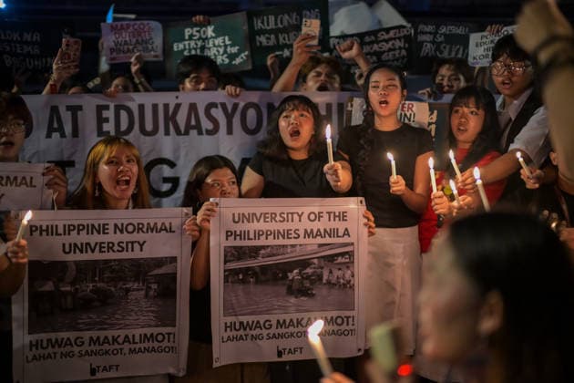 September 18, 2026, Philippines: Students from La Salle along with One Taft, a coalition of Taft-based schools, light candles to end the program of the Black Friday Protest on Friday at Taft Ave, Metro Manila. It coincided with the Black Friday Protests from different universities and a preparation for the mass movement on Sept. 21 for the Martial Law anniversary. Among the calls were for the alleged human rights abuses, corruption, and the Pax Silica initiative under the administration of President Ferdinand Marcos Jr. Philippines - ZUMAr240 20260918_zip_r240_024 Copyright: xMarcxDominicxRostratax