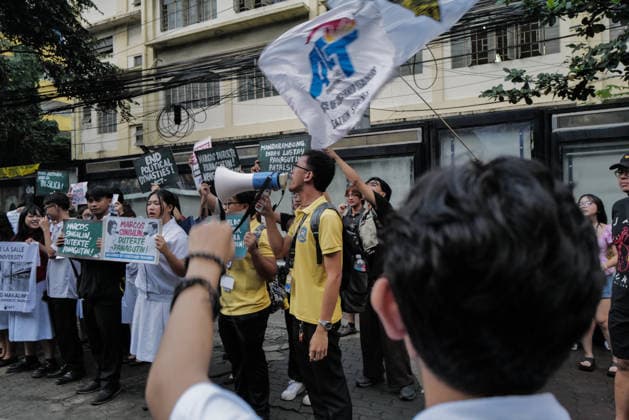September 18, 2026, Philippines: Students from La Salle along with One Taft, a coalition of Taft-based schools, stage a Black Friday Protest on Friday at Taft Ave, Metro Manila. It coincided with the Black Friday Protests from different universities and a preparation for the mass movement on Sept. 21 for the Martial Law anniversary. Among the calls were for the alleged human rights abuses, corruption, and the Pax Silica initiative under the administration of President Ferdinand Marcos Jr. Philippines - ZUMAr240 20260918_zip_r240_035 Copyright: xMarcxDominicxRostratax