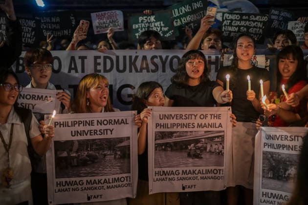 September 18, 2026, Philippines: Students from La Salle along with One Taft, a coalition of Taft-based schools, light candles to end the program of the Black Friday Protest on Friday at Taft Ave, Metro Manila. It coincided with the Black Friday Protests from different universities and a preparation for the mass movement on Sept. 21 for the Martial Law anniversary. Among the calls were for the alleged human rights abuses, corruption, and the Pax Silica initiative under the administration of President Ferdinand Marcos Jr. Philippines - ZUMAr240 20260918_zip_r240_019 Copyright: xMarcxDominicxRostratax