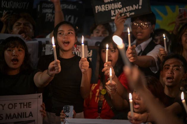 September 18, 2026, Philippines: Students from La Salle along with One Taft, a coalition of Taft-based schools, light candles to end the program of the Black Friday Protest on Friday at Taft Ave, Metro Manila. It coincided with the Black Friday Protests from different universities and a preparation for the mass movement on Sept. 21 for the Martial Law anniversary. Among the calls were for the alleged human rights abuses, corruption, and the Pax Silica initiative under the administration of President Ferdinand Marcos Jr. Philippines - ZUMAr240 20260918_zip_r240_016 Copyright: xMarcxDominicxRostratax