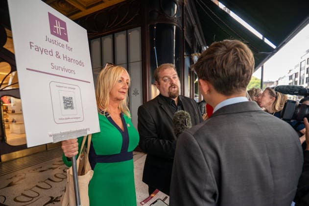 September 18, 2026, London, United Kingdom: Protesters give a TV interview during a demonstration outside the main entrance to the Harrods department store in Knightsbridge. Survivors of alleged sexual abuse by former Harrods owner Mohamed Al Fayed and their supporters hold a demonstration outside Harrods department store in Knightsbridge, London. Protesters held placards, handed leaflets to members of the public and stood behind a large campaign banner outside the store entrance. The survivors are calling for the findings of a previous inquiry into allegations against Al Fayed to be made public and for a further public inquiry to examine the allegations and establish the truth surrounding the claims. London United Kingdom  - ZUMAs197 20260918_aaa_s197_022 Copyright: xJamesxWilloughbyx