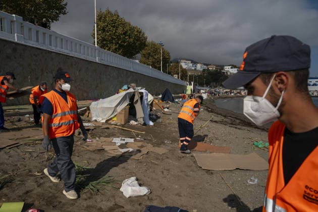 Migrants relocated from Ceuta beaches in Spain CEUTA, SPAIN - SEPTEMBER 18: Police transfer approximately 1,700 migrants from Trampolín and Benitez beaches to new facilities at the port of Ceuta amid heightened tensions, including a stampede, police baton strikes, shots fired into the air and several injuries, in Ceuta, Spain, on September 18, 2026. Jose Colon Anadolu Ceuta Spain. Editorial use only. Please get in touch for any other usage.  Copyright: x2026xAnadoluxJosexColonx