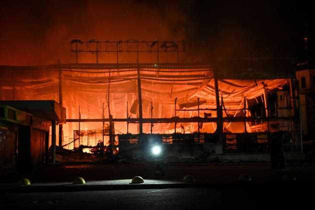 Russian army strikes shopping centre in Zaporizhzhia A rescuer with a flashlight works during response efforts following a Russian drone strike on the Amstor shopping centre in the Khortytskyi district of Zaporizhzhia, Ukraine, on September 17, 2026. Rescuers extinguished the fire, which covered a total area of more than 10,000 square metres. Their work was complicated by constant threats of repeated Russian strikes, forcing firefighters to take shelter. The shopping centre was completely destroyed, and one person was injured, Credit:Dmytro Smolienko Ukrinform Avalon Ukraine, Zaporizhzhia  Copyright: xDmytroxSmolienkox xUkrinformx xAvalonx 1136070502