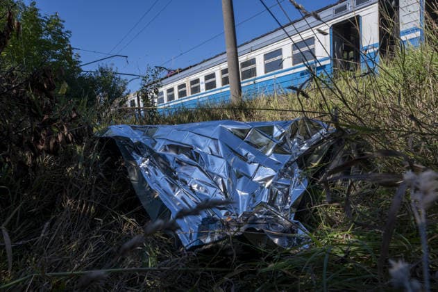 Russians attack on a commuter passenger train in Kharkiv KHARKIV, UKRAINE - SEPTEMBER 18 Officials investigate the train following a Russian attack on a commuter passenger train at the Lypkuvativka railway station with a Geran-4 jet drone in Kharkiv, Ukraine on September 18, 2026. Eight people were injured and a 30-year-old passenger was killed. The attack caused a fire in two train cars. Serhii Masin Anadolu Kharkiv Ukraine. Editorial use only. Please get in touch for any other usage.  Copyright: x2026xAnadoluxSerhiixMasinx