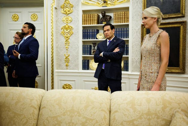 DC: President Trump Announces New Most Favored Nation Drug Pricing for Medicaid Secretary of State Marco Rubio (center) and executive assistant to the President Natalie Harp (left) stand in the back of the Oval Office as President Donald Trump answers questions from reporters at the White House on September 18, 2026 in Washington, D.C. Many countries have negotiated prices for certain drugs that are significantly lower than what Americans pay for the same medication and the new deal will allow states Medicaid programs to benefit from those lower prices. (Photo by Samuel Corum Pool ABACAPRESS.COM) Washington DC United States  Copyright: xPool ABACAx