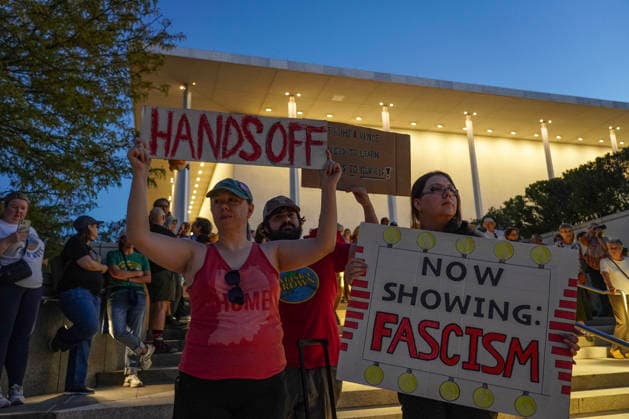Demonstrators participate in the Hands Off the Arts Kennedy Center protest, objecting to President Donald Trump s call for the possibility of demolishing the Kennedy Center at the John F. Kennedy Center for the Performing Arts on Friday, September 18, 2026 in Washington DC. Several hundreds of activists held signs and walked the premises calling for President Trump to be removed as the chairman of the Kennedy Center.  WAP20260918920 LeighxVogel