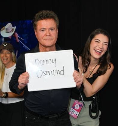 iHeartRadio Music Festival, night 1 Arrivals for the iHeartRadio Music Festival, night 1 at T-Mobile arena. 18 Sep 2026 Pictured: Donny Osmond (L) and Peyton Webb.  Copyright: xThexMegaxAgencyxMBS MEGAx