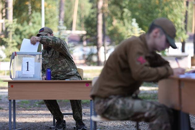RUSSIA, PENZA - SEPTEMBER 19, 2026: A man casts his vote at a mobile ballot box at the Meridian sports and health camp during the 2026 Russian legislative election held on September 18-20, including regional parliamentary and local elections, as well as the election to the Russian State Duma of the 9th convocation. Yegor Aleyev TASS  97941065
