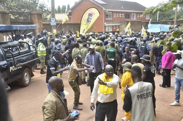 Police block Ugandans protesters at Turkish embassy. Uganda, Kampala - September 18, 2026: Police block Ugandans protesters at Turkish embassy. KAMPALA, Sept. 18. Police Battled with hundreds of Ugandans protesters who tried to access the Turkish Embassy in Kampala capital city Uganda on Friday. The protesters under political pressure group, Patriotic League of (PLU), head by the Country’s Chief of Defence forces(CDF), Gen. Muhoozi Kainerugaba had forcefully tried to access the Turkish embassy located in Kololo, Kampala capital city. Earlier on at around 8.30am in the morning the group converged at lugogo cricket oval grounds, Kampala capital city and they started matching holding placards and banners. The banners and placards had words li Copyright: xx