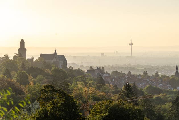 Frankfurt in the Morning: A view across Kronberg Castle to the Frankfurt am Main skyline in the morning sun, Kronberg, Hesse, Germany