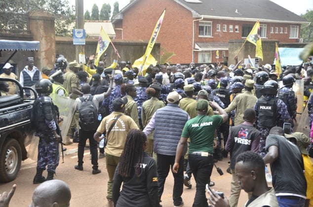 Police block Ugandans protesters at Turkish embassy. Uganda, Kampala - September 18, 2026: Police block Ugandans protesters at Turkish embassy. KAMPALA, Sept. 18. Police Battled with hundreds of Ugandans protesters who tried to access the Turkish Embassy in Kampala capital city Uganda on Friday. The protesters under political pressure group, Patriotic League of (PLU), head by the Country’s Chief of Defence forces(CDF), Gen. Muhoozi Kainerugaba had forcefully tried to access the Turkish embassy located in Kololo, Kampala capital city. Earlier on at around 8.30am in the morning the group converged at lugogo cricket oval grounds, Kampala capital city and they started matching holding placards and banners. The banners and placards had words li Copyright: xx
