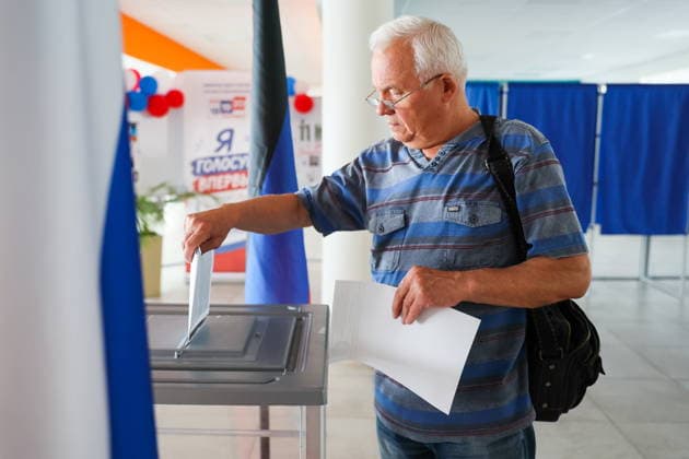 RUSSIA, DONETSK - SEPTEMBER 19, 2026: A man casts his vote at polling station No. 199 during the 2026 Russian legislative election held on September 18-20, including regional parliamentary and local elections, as well as the election to the Russian State Duma of the 9th convocation. Dmitry Yagodkin TASS  97941919