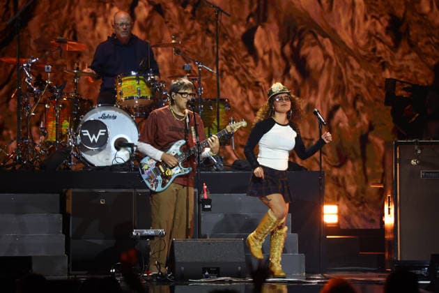 (Right) singer Remi Wolf performs with Weezer on stage during the iHeartRadio Music Festival Concerts at T-Mobile Arena in Las Vegas, Nevada on Friday, September 18, 2026s.  LAV20260918008 JAMESxATOA