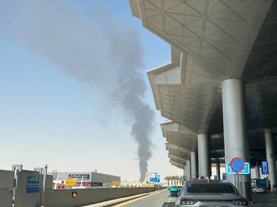 (260919) -- RIYADH, Sept. 19, 2026 -- This photo taken with a mobile phone on Sept. 19, 2026 shows thick smoke rising near King Khalid International Airport in northeastern Riyadh, Saudi Arabia. Photo Flash Explosions heard again in Riyadh LuoxChen 