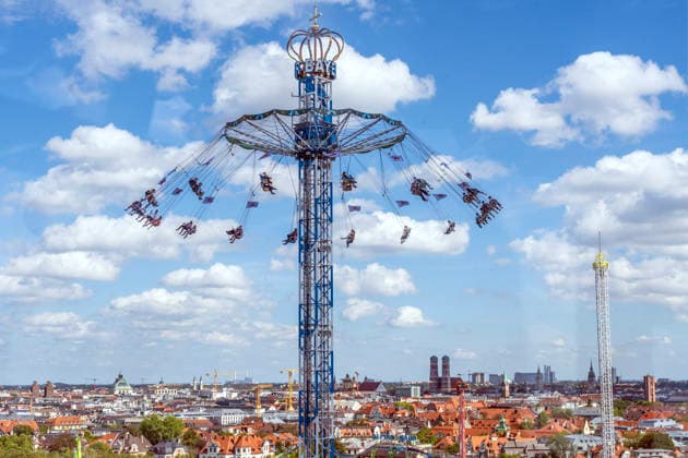 Oktoberfest 2026, view from the Ferris wheel of the BayernTower, with the city of Munich and its landmark, the Frauenkirche, on the