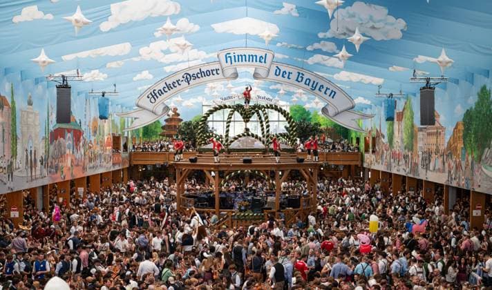 (260919) -- MUNICH, Sept. 19, 2026 -- People enjoy beer at the Oktoberfest in Munich, Germany, Sept. 19, 2026. The 191st Oktoberfest, one of the largest folk festivals in Germany, opened on Saturday in Munich, with mayor Dominik Krause tapping the first barrel of beer as a tradition. This year s festival will last until Oct. 4. ) GERMANY-MUNICH-OKTOBERFEST-OPENING ZhangxHaofu 
