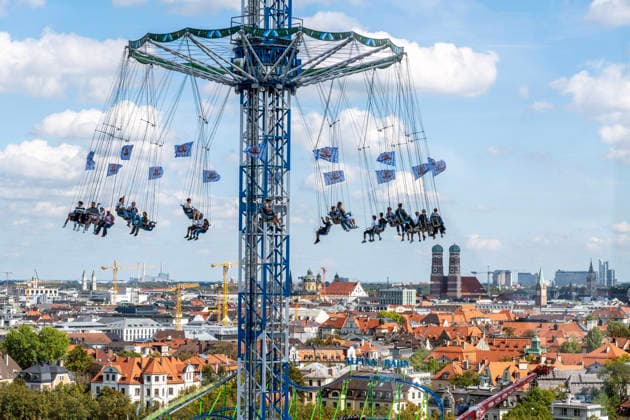 Oktoberfest 2026, view from the Ferris wheel of the BayernTower, with the city of Munich and its landmark, the Frauenkirche, on th