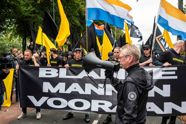 September 19, 2026, Den Haag - The Hague, South Holland, The Netherlands Holland: September 19, 2026, The Hague, the Netherlands. A far-right activist shouts slogans to supporters through a megaphone. Several hundred anti-immigration and anti-government demonstrators gathered on the Malieveld under the banner Wij Zijn Het Volk, throwing fireworks and uprooted traffic bollards at riot police, who deployed a water cannon. Authorities banned the planned march, dissolved the demonstration and imposed an emergency order over much of the city center. Den Haag - The Hague The Netherlands Holland  - ZUMAp202 20260919_zip_p202_003 Copyright: xJamesxPetermeierx