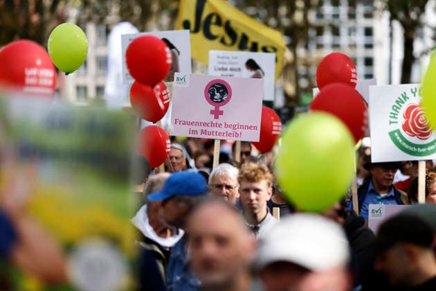 Protesters at the fourth March for Life in Cologne. A protester holds a sign reading, Women’s rights begin in the womb. The March for Life is a demonstration organized by the pro-life movement. It is organized by the Federal Association for the Right to Life. Protesters are Copyright: xChristophxHardtx