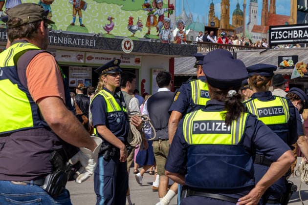 Munich, Bavaria, Germany September 19, 2026: Police officers are maintaining a strong presence on the festival grounds during the 191st Oktoberfest in 2026. The officers are part of the security plan and are ensuring safety and order among the visitors