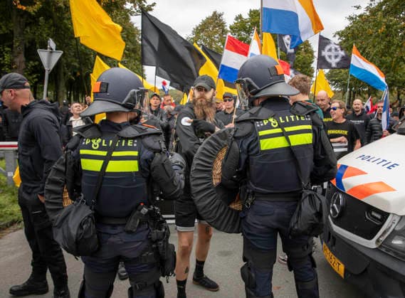 Protest in The Hague Over Immigration and Government Policy Demonstrators take part in the far-right Wij Zijn Het Volk (We Are the People) protest against immigration and asylum policies at the Malieveld in The Hague, Netherlands, on September 19, 2026. The demonstration ended in disturbances after a planned protest march through the city centre was not allowed to proceed. A group of protesters threw fireworks, beer cans, flares and other objects at police officers and journalists, eventually breaking through a riot police line. An emergency order was imposed and police intervened, with several people arrested. The Hague Netherlands  Copyright: xMatrixxImagesx xHedayatullahxAmix