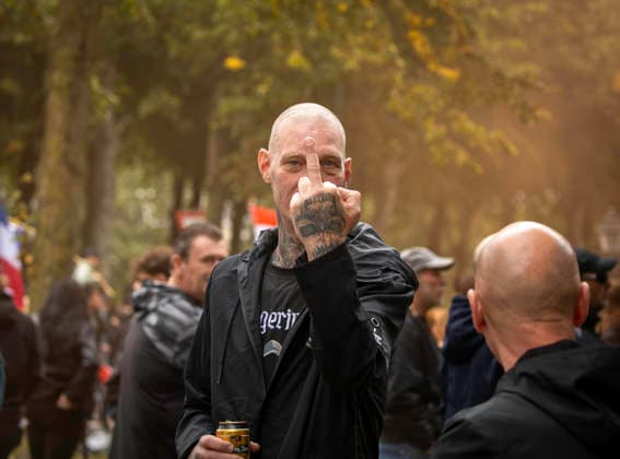 Protest in The Hague Over Immigration and Government Policy A demonstrator gestures toward the camera during the far-right Wij Zijn Het Volk (We Are the People) protest against immigration and asylum policies at the Malieveld in The Hague, Netherlands, on September 19, 2026. The demonstration ended in disturbances after a planned protest march through the city centre was not allowed to proceed. A group of protesters threw fireworks, beer cans, flares and other objects at police officers and journalists, eventually breaking through a riot police line. An emergency order was imposed and police intervened, with several people arrested. The Hague Netherlands  Copyright: xMatrixxImagesx xHedayatullahxAmix