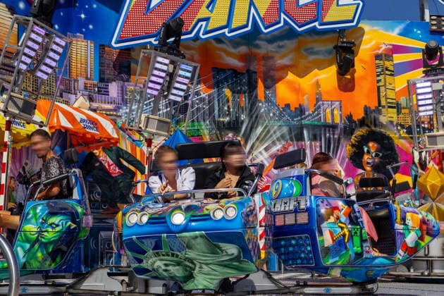 Munich, Bavaria, Germany - September 19, 2026: Visitors ride the Break Dance at the 191st Oktoberfest in 2026. This fast-paced carousel also spins individual gondolas around their own axes, providing speed, movement, and thrills