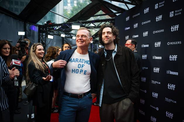 September 19, 2026, Toronto, On, Canada: Darrell Fox, brother of Terry Fox, left, and director Sean Menard are pictured on the red carpet for Run Terry Run at the Toronto International Film Festival in Toronto, on Saturday, Sept. 19, 2026. Toronto Canada  - ZUMAc35_ 20260919_zaf_c35_118 Copyright: xLauraxProctorx