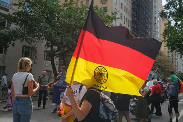 September 19, 2026, New York, New York, USA: German flag at the annual German American Steuben Parade marched up Fifth Avenue .celebrating the German American community and Prussian General Friedrich Wilheim Von Steuben.who served with General George Washington during the Revolutionary War. It honors German American.identity with social clubs, religious groups, schools, sport clubs and musicians from Germany. German NATO.troops marched up the avenue as well in the procession. New York USA  - ZUMAh156 20260919_znp_h156_018 Copyright: xMiloxHessx