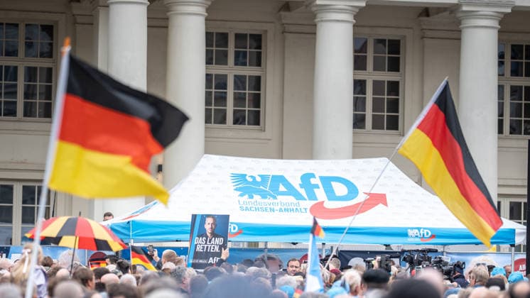Scenes from the closing event in Schwerin featuring AfD flags marking the end of the campaign for the 2026 state election in Mecklenburg-Western Pomerania, held in Schwerin, Mecklenburg-Western Pomerania, Germany, at Am Markt