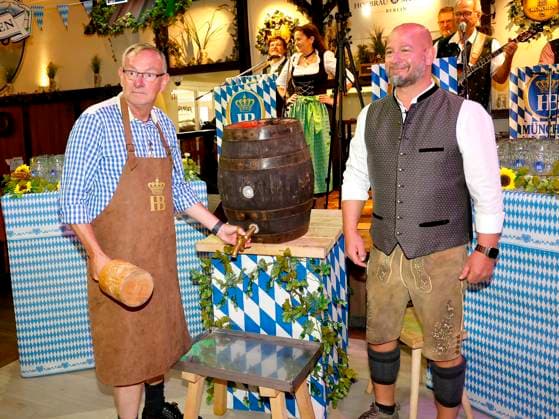 Bernd Siggelkow and Björn Schwarz at the keg tapping ceremony during the Oktoberfest Mittagsanstich at the Hofbräuhaus Berlin with Pastor Bernd Siggelhow