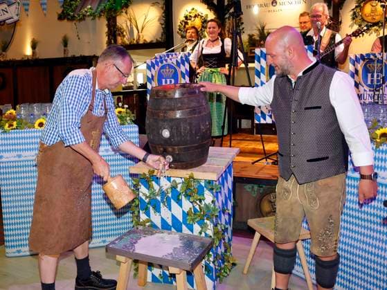Bernd Siggelkow and Björn Schwarz at the Oktoberfest noon tapping ceremony at the Hofbräuhaus Berlin with Pastor Bernd Siggelhow