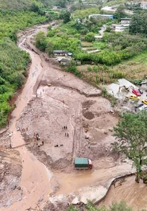 (260920) -- YANBIAN, Sept. 20, 2026 -- This aerial drone photo taken on Sept. 20, 2026 shows the site of a mudslide in Yanbian County, southwest China s Sichuan Province. Two people have been found dead and three others are missing after a mudslide hit southwest China s Sichuan Province early Saturday, local authorities said. The mudslide occurred near Zhiliuhe Village in Yanbian County, Panzhihua City. The provincial emergency management department has dispatched a working team to the scene to guide rescue efforts. ) (SpotNews) CHINA-SICHUAN-YANBIAN-MUDSLIDE-RESCUE (CN) LiuxKun 