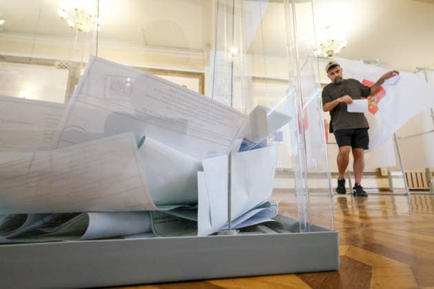 RUSSIA, SEVASTOPOL - SEPTEMBER 20, 2026: A man visits a polling station at the Centre of Culture and Arts on Lenin Street to vote in the 2026 Russian legislative election held on September 18 to 20 and including regional parliamentary and local elections as well as the election to the Russian State Duma of the 9th convocation. Sergei Malgavko TASS  98015535