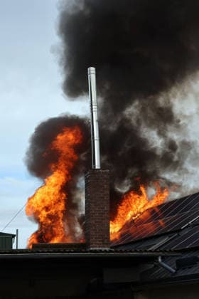 Flames and smoke are rising from the roof; a fire has broken out in the former workshop building of Naturstein Stefan Wormser, located at Pestalozzistraße and Friedhofsweg in Pegnitz, September 20, 2026, Upper Franconia, Bavaria,