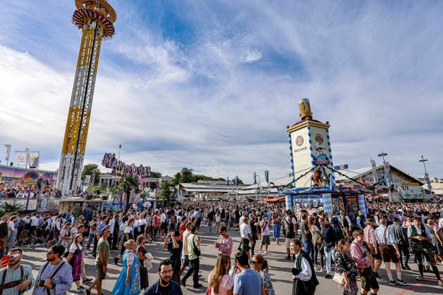 Tens of thousands of visitors celebrate Oktoberfest on the first day of the Wiesn in 2026 in Munich. Scenes from the 2026 Wiesn festival grounds at Theresienwiese in Munich, Bavaria, Germany