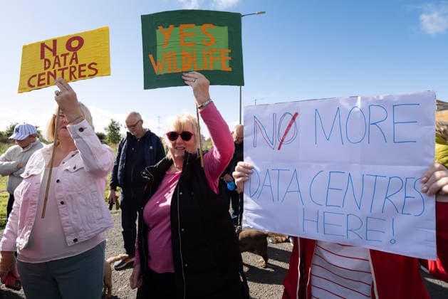 September 20, 2026, Chapelhall, Scotland, UK: Residents and their supporters opposed to plans for a hyperscale data centre in Chapelhall, North Lanarkshire, held a protest at the site of the proposed 24 acre development. They cite concerns that the 100MW development, which could eventually form part of a larger 500MW AI Growth Zone in the area, will have negative impacts on local traffic, noise levels, energy infrastructure and wildlife habitat. Chapelhall UK  - ZUMAs357 20260920_zip_s357_008 Copyright: xCameronxScottx