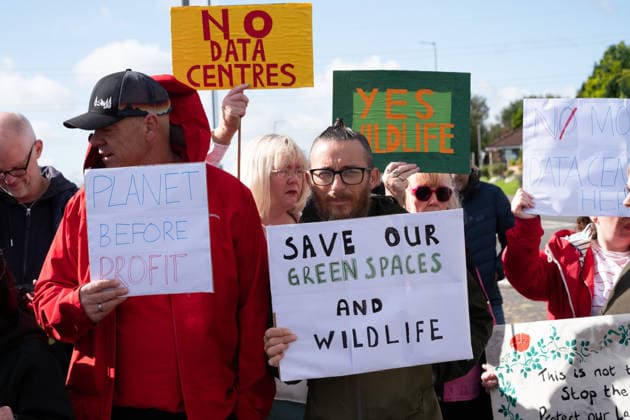 September 20, 2026, Chapelhall, Scotland, UK: Residents and their supporters opposed to plans for a hyperscale data centre in Chapelhall, North Lanarkshire, held a protest at the site of the proposed 24 acre development. They cite concerns that the 100MW development, which could eventually form part of a larger 500MW AI Growth Zone in the area, will have negative impacts on local traffic, noise levels, energy infrastructure and wildlife habitat. Chapelhall UK - ZUMAs357 20260920_zip_s357_018 Copyright: xCameronxScottx