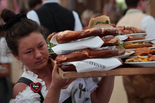 September 20, 2026, Munich, Bavaria, Germany: On the second day of Oktoberfest, the worldÃ¢â‚¬â ¢s largest beer festival, people gather in Munich to watch the parade to the festival grounds. Munich Germany - ZUMAm309 20260920_zip_m309_020 Copyright: xJuliusxMortsix